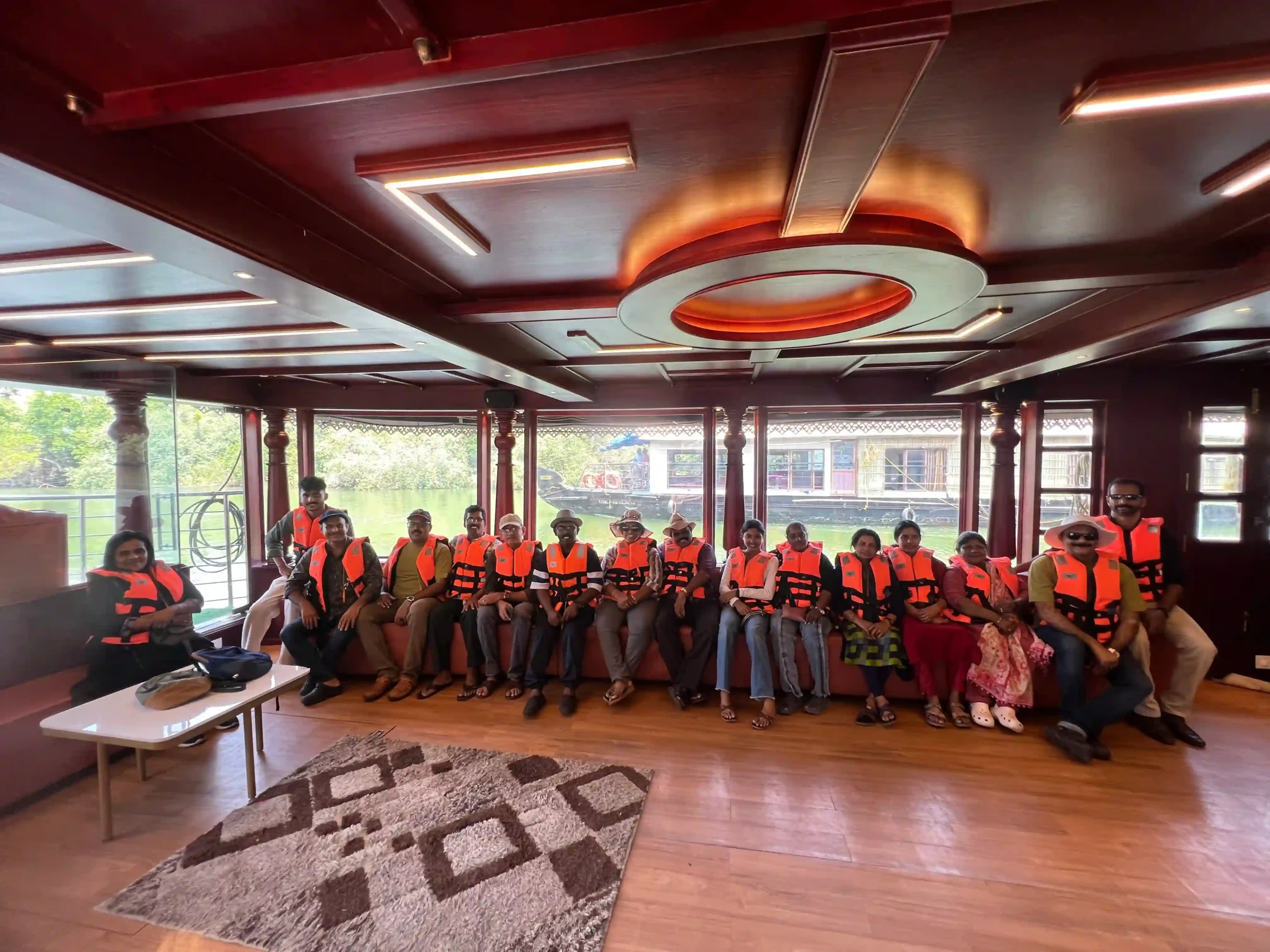 Full group photo of ANTS members inside the houseboat